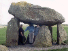 Medb, Bran, and Sine tempt fate at Pentre Ifan (05/06/99). Click here for full size image.