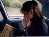 Stephanie studies up on our next destination (05/07/99). Click here for full size image.