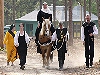 Baroness Rowen is led in on horseback for Their Excellencies First Court by Lady Victoria Pringle. Click here for full size image.