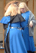 Mistress Rhiannon puts on Deirdre's House Corvus belt. Click here for full size image.