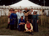 Family portrait: Oshi, Medb, Peter, Krystyne, Michael (kneeling), Bran, Giuseppe (sitting), Alys, William, and Sine. Click here for full size image.