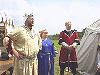 King Cuan, Mistress Rhiannon, and Master Bran stand-by Peter's vigil tent. Click here for full size image.